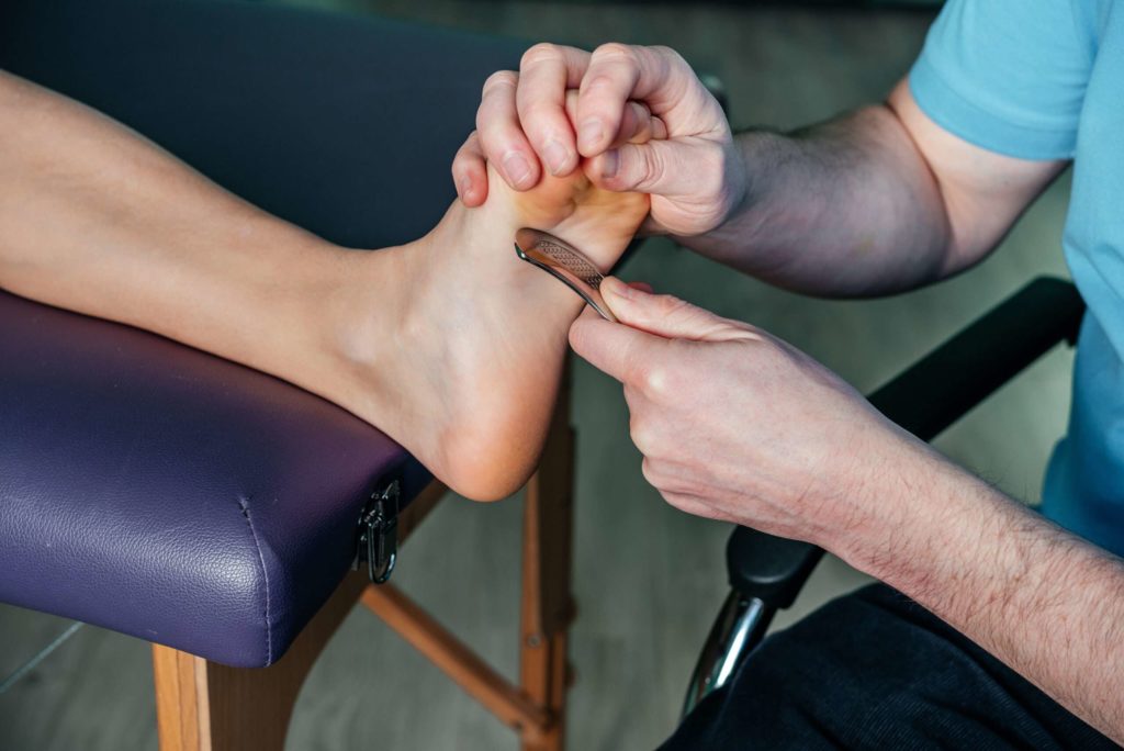 Complementary myofascial release therapy for clients with plantar fasciitis or heel spur syndrome with IASTM guasha tool, Instrument assisted soft tissue mobilization technique